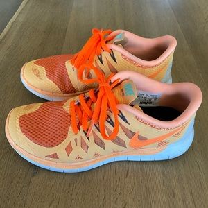 Nike free women’s shoes. Size 7. Color orange.